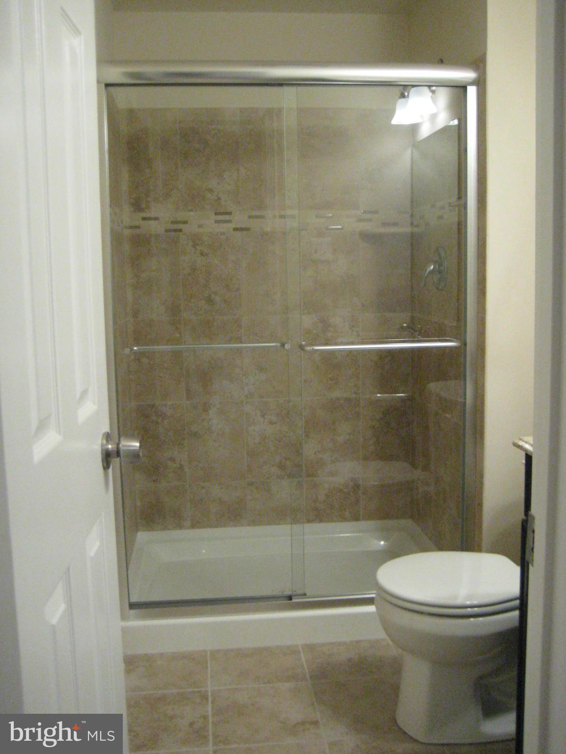 14054 Harrisville Road Mount Airy, MD 21771 - Photo 5 of 12 Designer tile & thick cut glass shower doors
