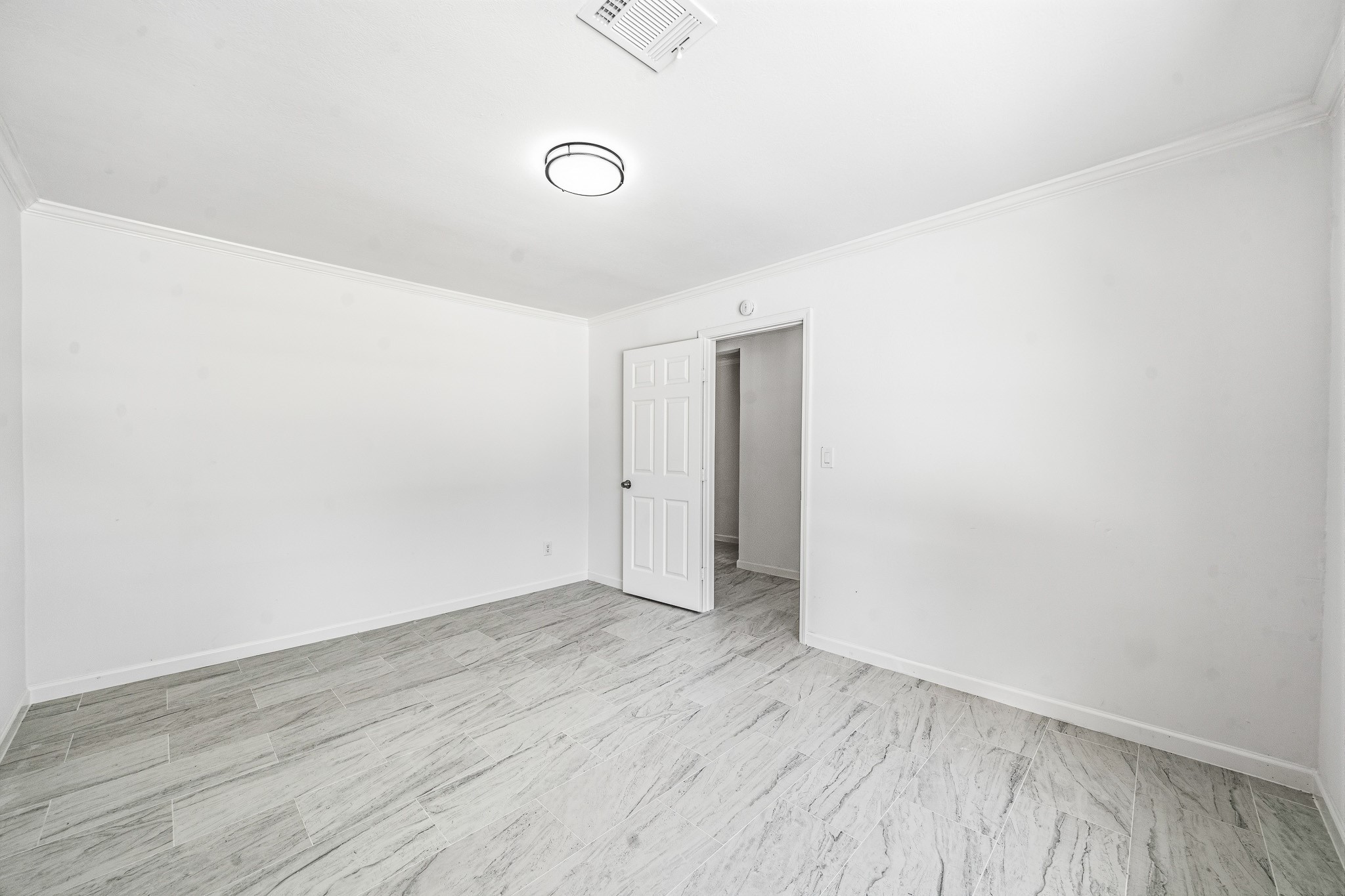 111 Princess Drive Houston, TX 77034 - Photo 7 of 30 a view of an empty room with wooden floor