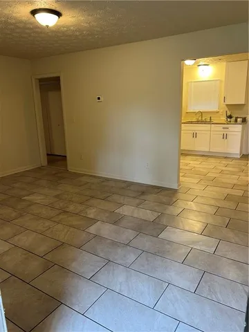 a view of a kitchen with a sink