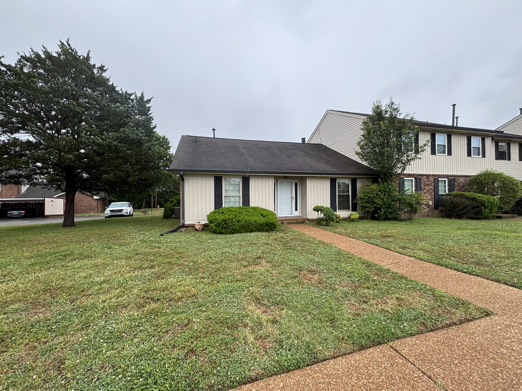 4001 Anderson Road, Unit C115 Nashville, TN 37217 - Photo 19 of 19 a front view of a house with a yard