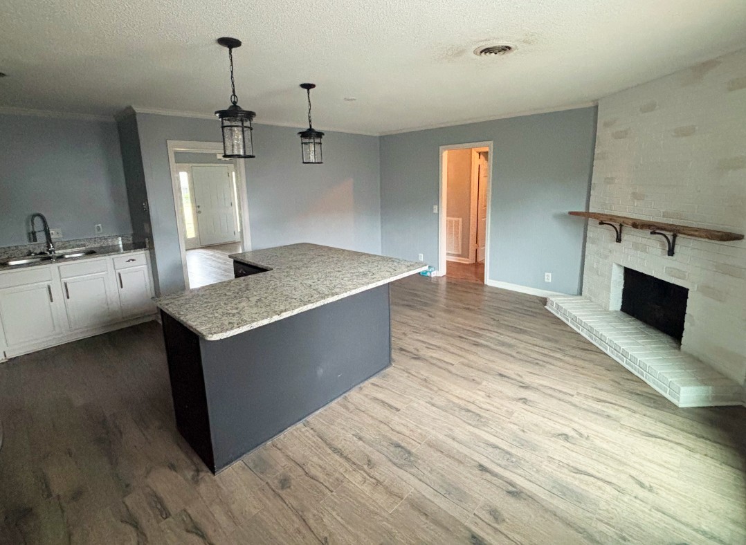 4001 Anderson Road, Unit C115 Nashville, TN 37217 - Photo 2 of 19 a kitchen with stainless steel appliances granite countertop a sink a stove top oven a counter space and cabinets