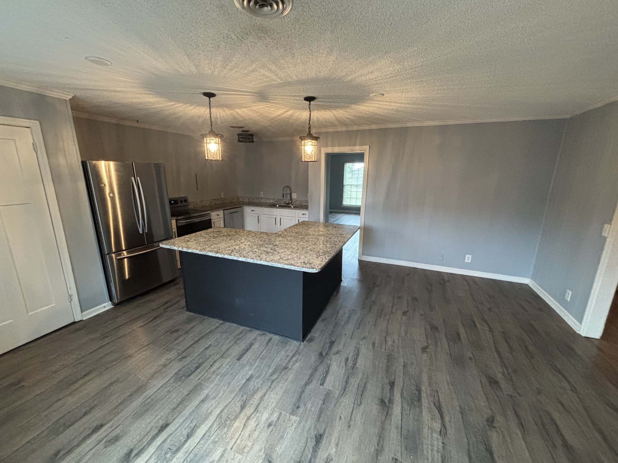 4001 Anderson Road, Unit C115 Nashville, TN 37217 - Photo 3 of 19 a room with wooden floor and natural light
