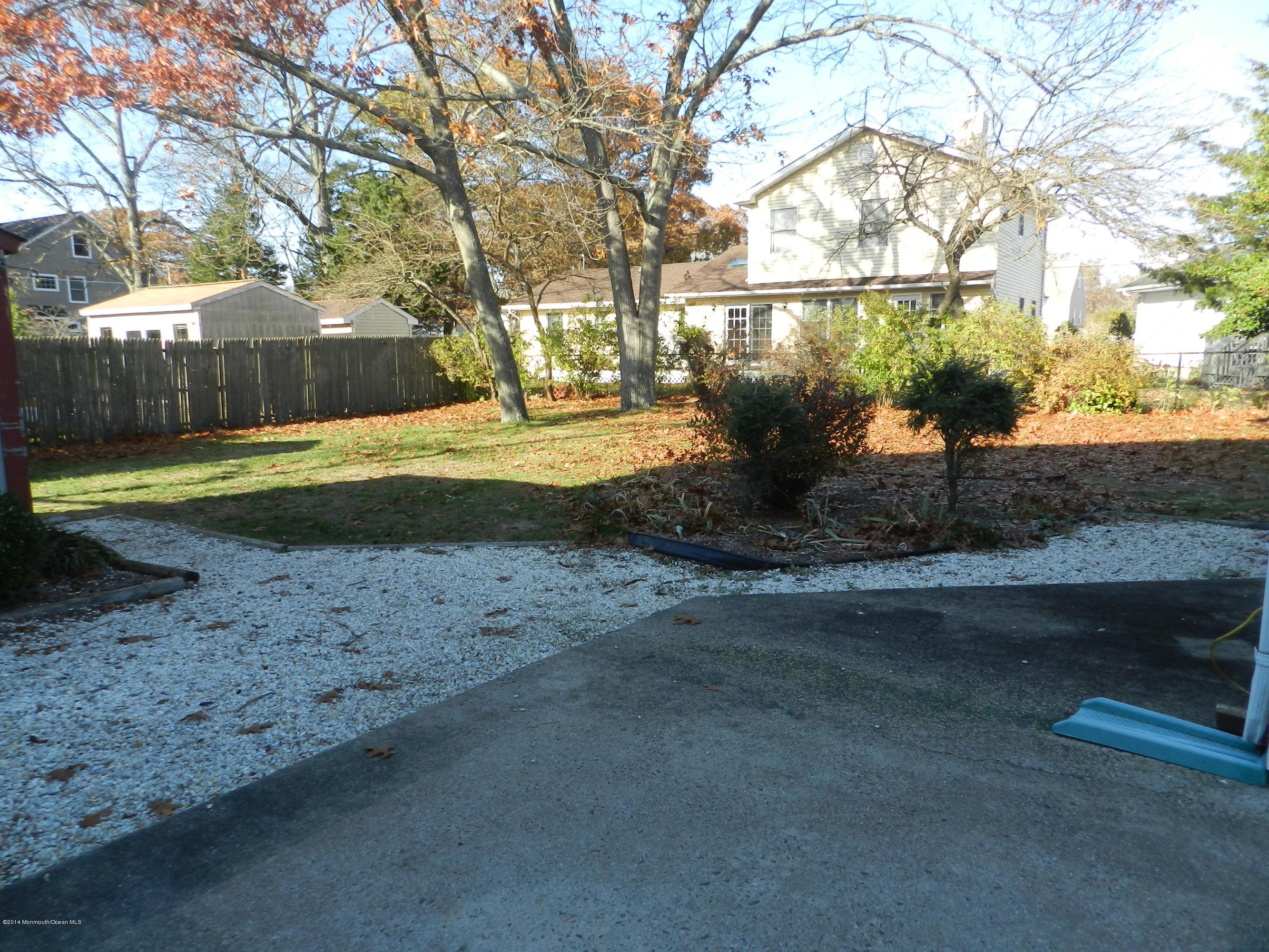 1403 Dorsett Dock Road Point Pleasant, NJ 08742 - Photo 14 of 18 a view of backyard with green space