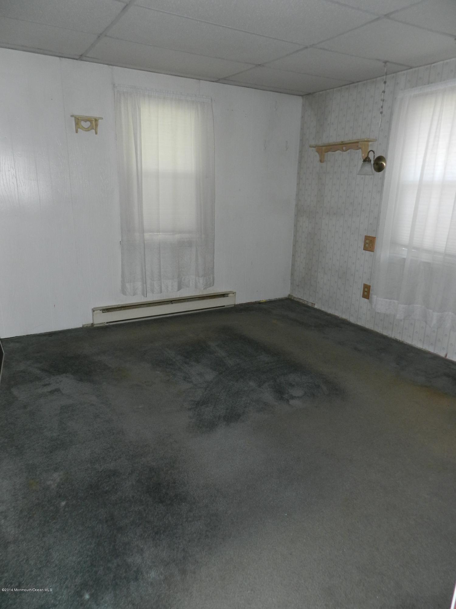 1403 Dorsett Dock Road Point Pleasant, NJ 08742 - Photo 5 of 18 a view of an empty room