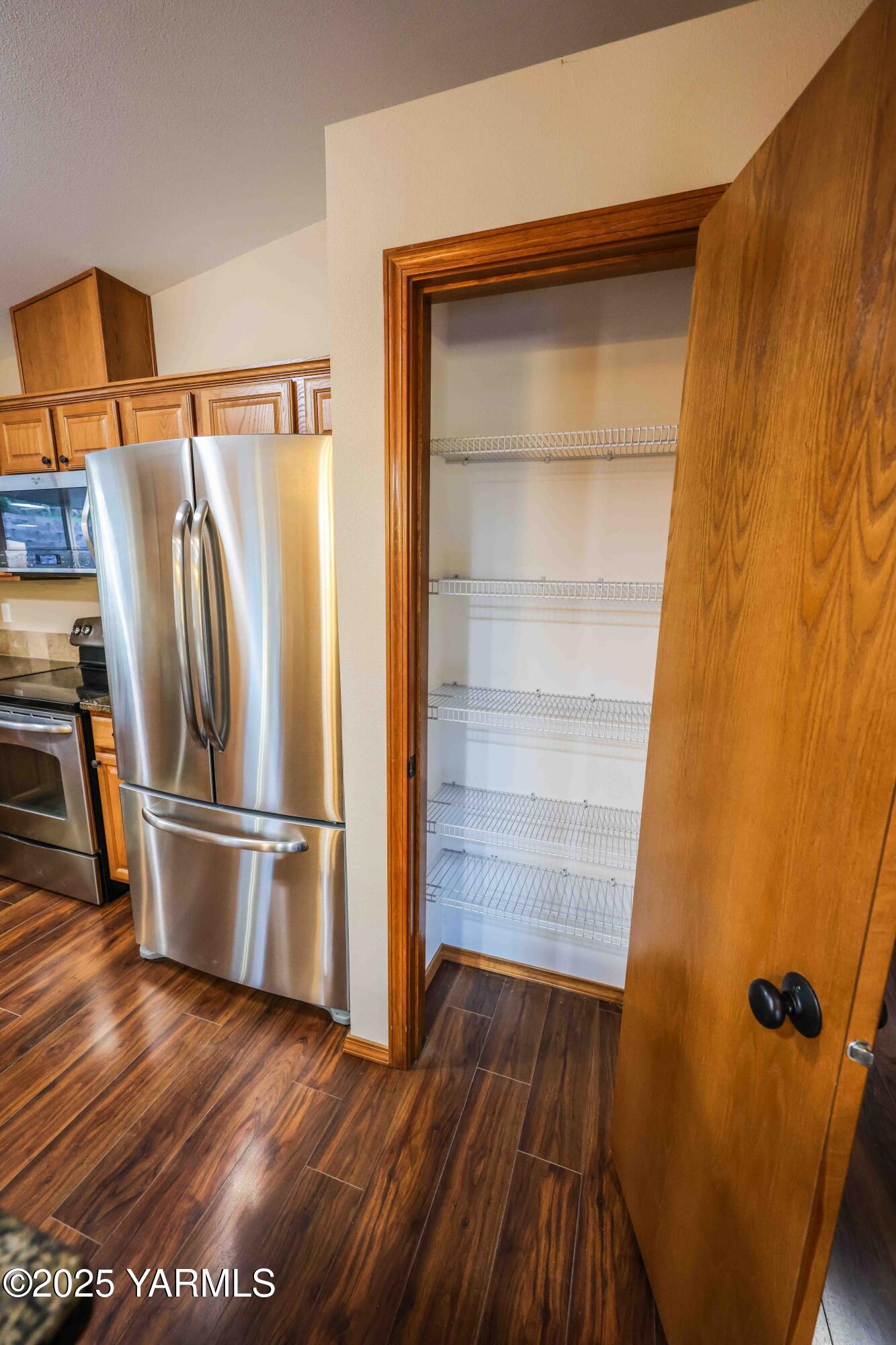 320 Westridge Road Selah, WA 98942 - Photo 28 of 53 a view of walk in closet with wooden floor