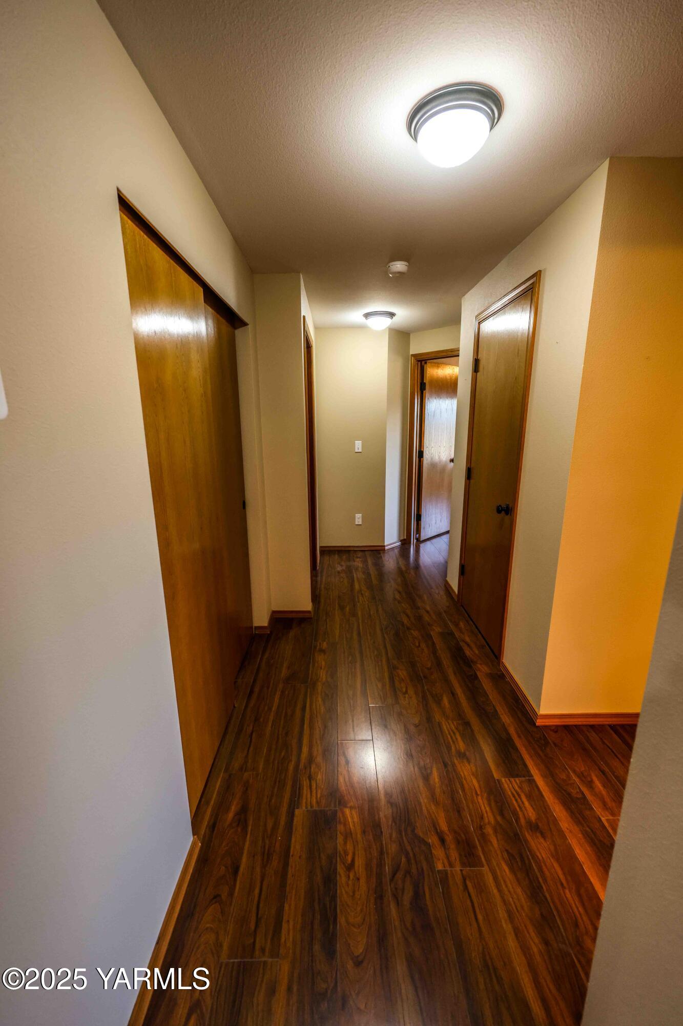 320 Westridge Road Selah, WA 98942 - Photo 33 of 53 a view of a hallway with wooden floor