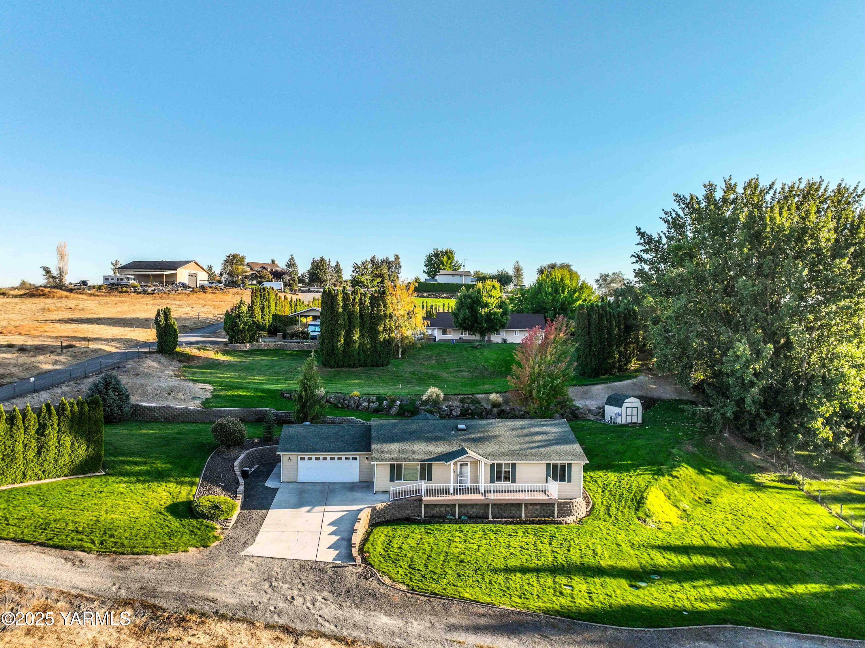 320 Westridge Road Selah, WA 98942 - Photo 4 of 53 an aerial view of a house with garden space and outdoor seating