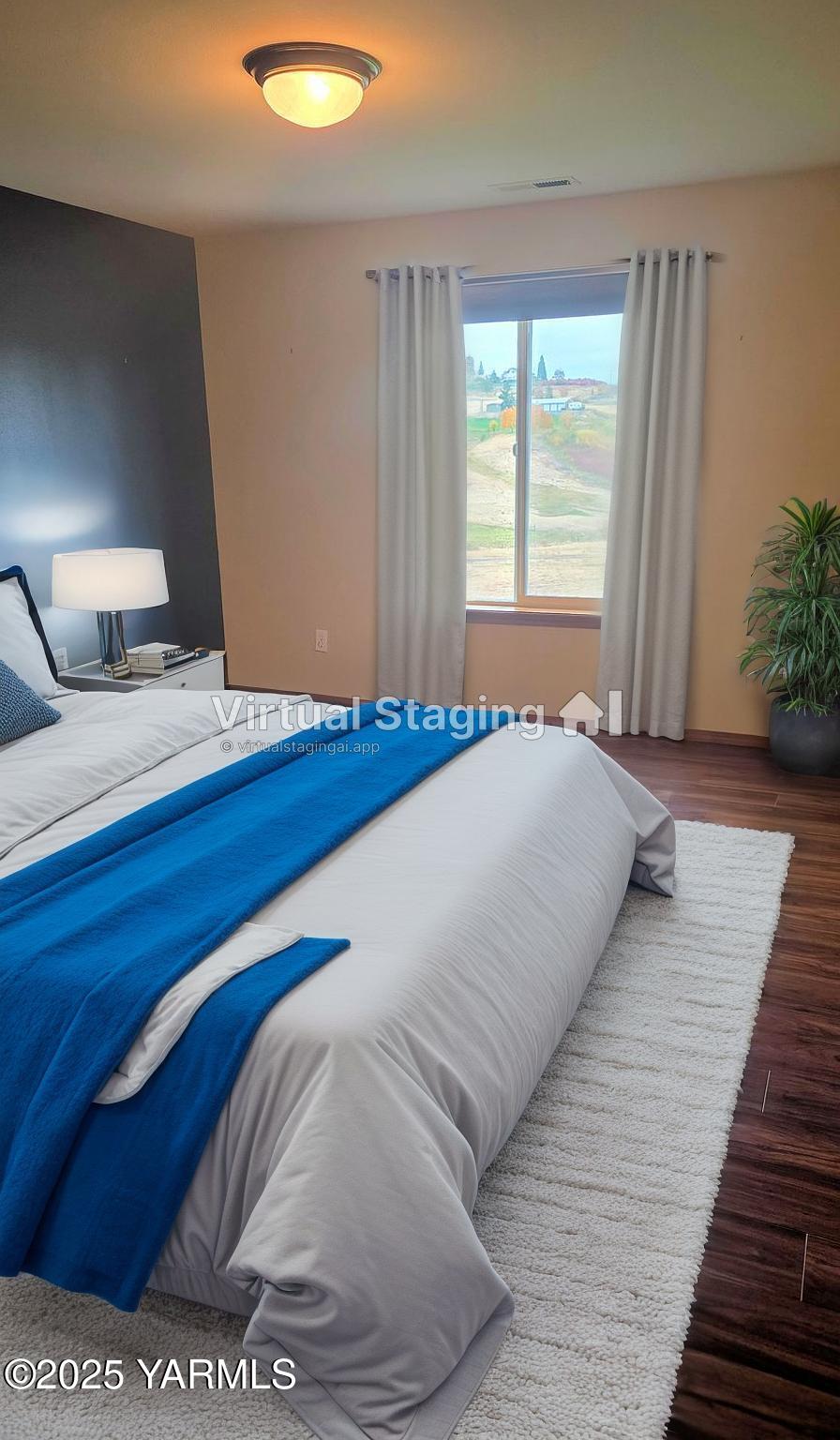 320 Westridge Road Selah, WA 98942 - Photo 43 of 53 a bedroom with a bed and window