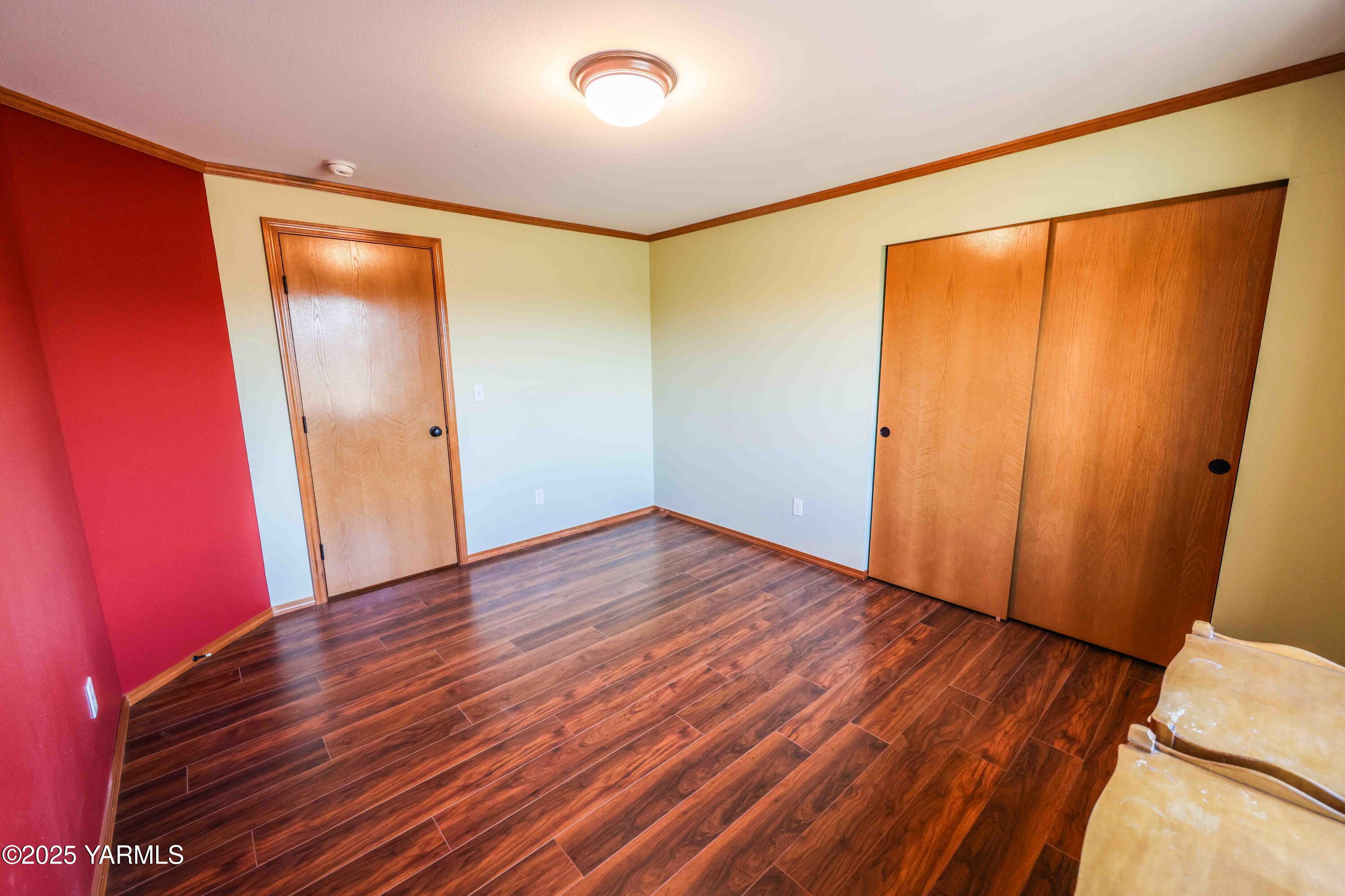 320 Westridge Road Selah, WA 98942 - Photo 46 of 53 a view of an empty room with wooden floor and a window