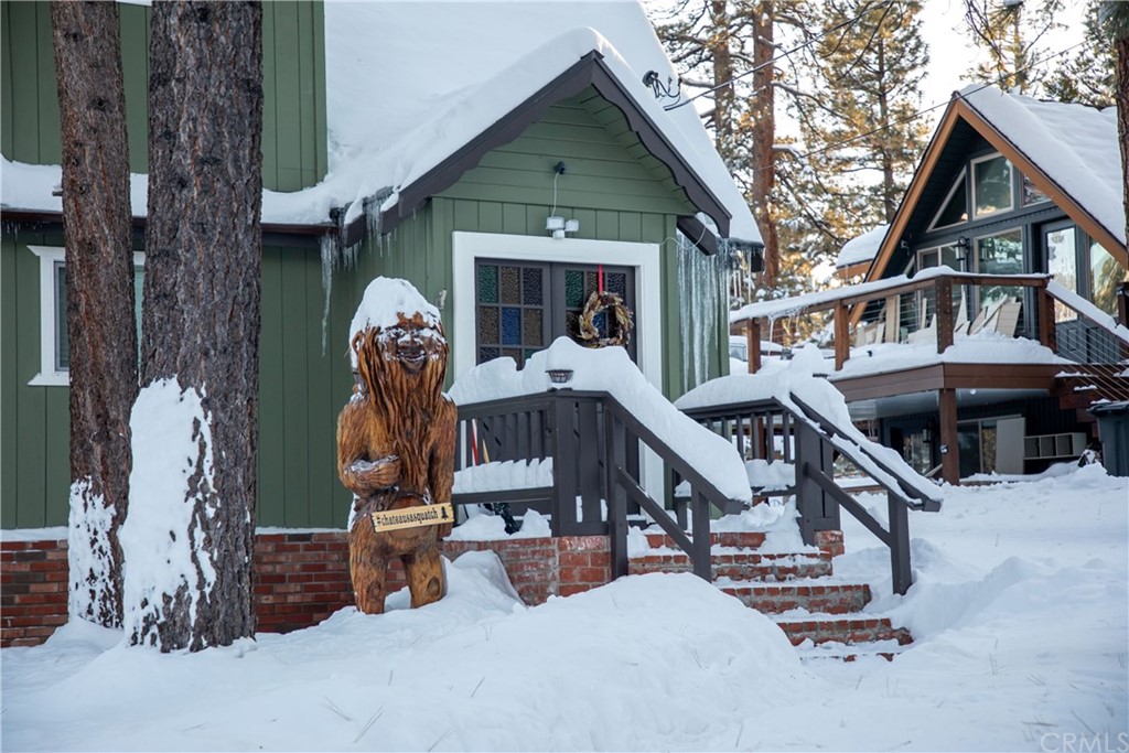 1126 Sugarpine Road Big Bear City, CA 92314 - Photo 1 of 1 a front view of a house with garage