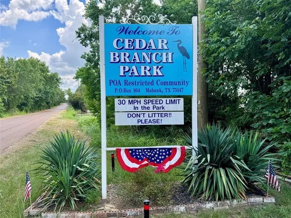 a sign on the side of the road