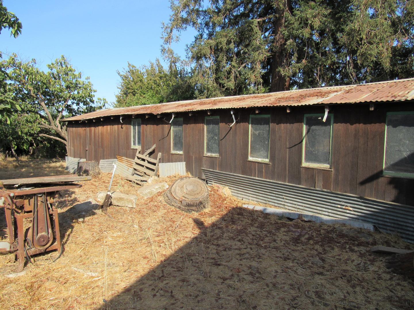 330 Day Road Gilroy, CA 95020 - Photo 6 of 8 a view of backyard with wooden fence and trees