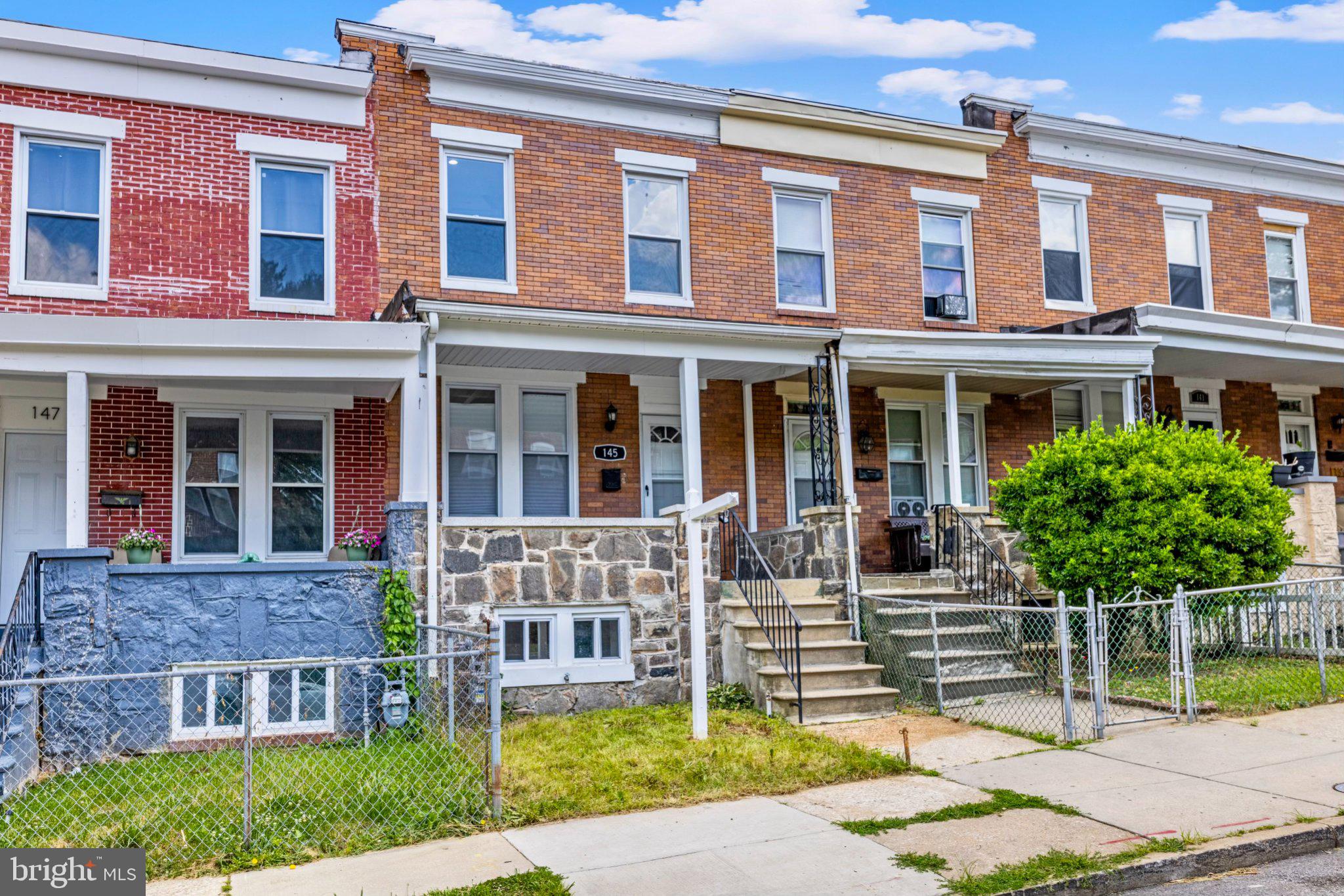 145 North Monastery Avenue Baltimore, MD 21229 - Photo 31 of 45 Charming row homes with vibrant facades.