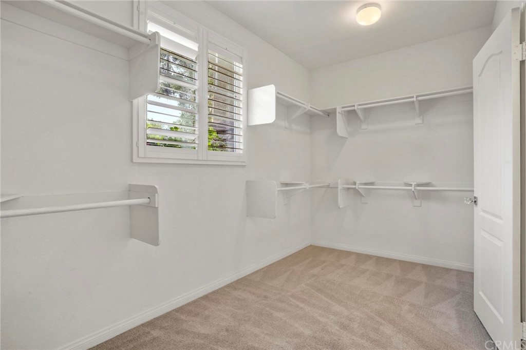 569 Inverlochy Drive Fallbrook, CA 92028 - Photo 22 of 36 a view of an empty room with a window