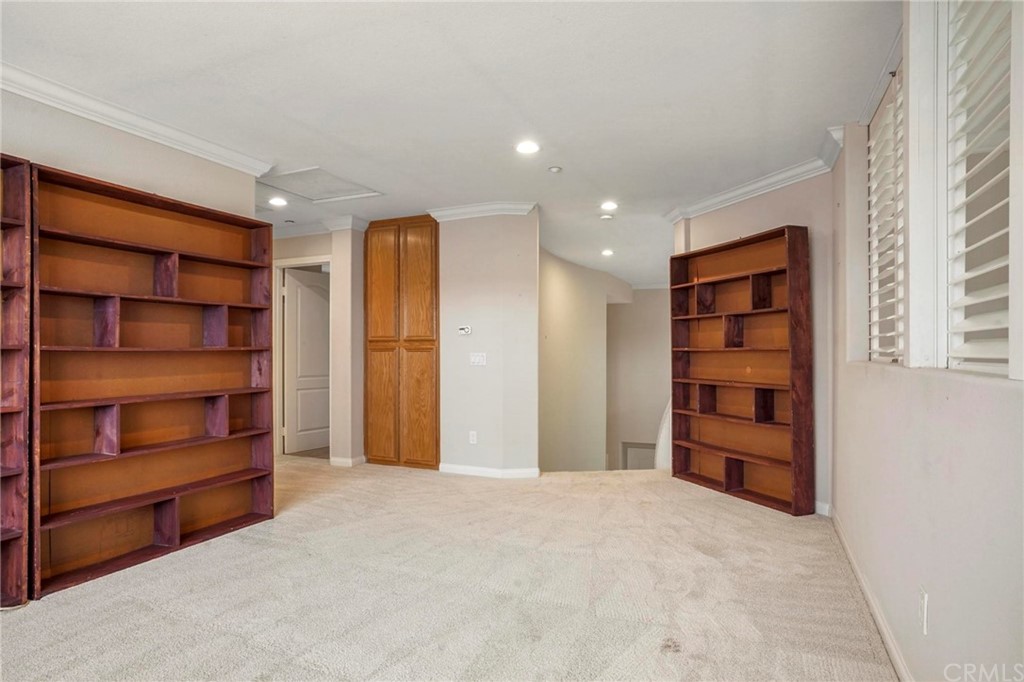 569 Inverlochy Drive Fallbrook, CA 92028 - Photo 24 of 36 a view of walk in closet with empty racks