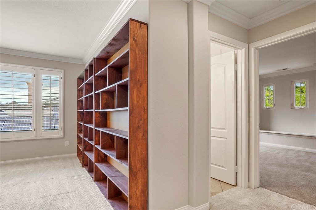 569 Inverlochy Drive Fallbrook, CA 92028 - Photo 25 of 36 a view of walk in closet with empty racks