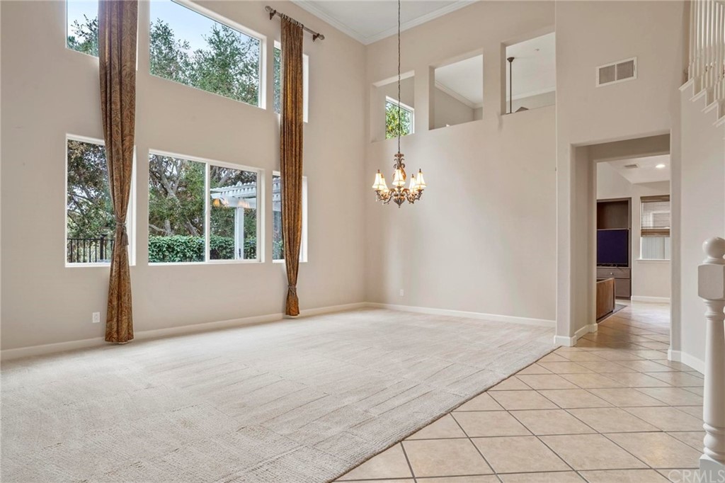 569 Inverlochy Drive Fallbrook, CA 92028 - Photo 6 of 36 a view of an empty room with a window