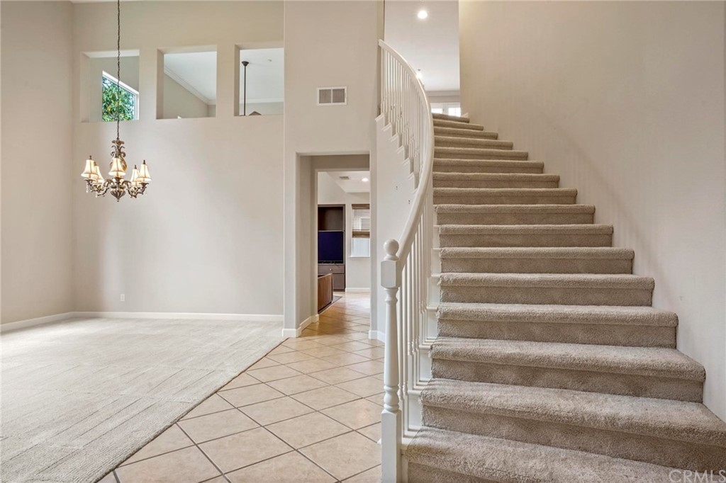 569 Inverlochy Drive Fallbrook, CA 92028 - Photo 7 of 36 a view of an entryway with staircase