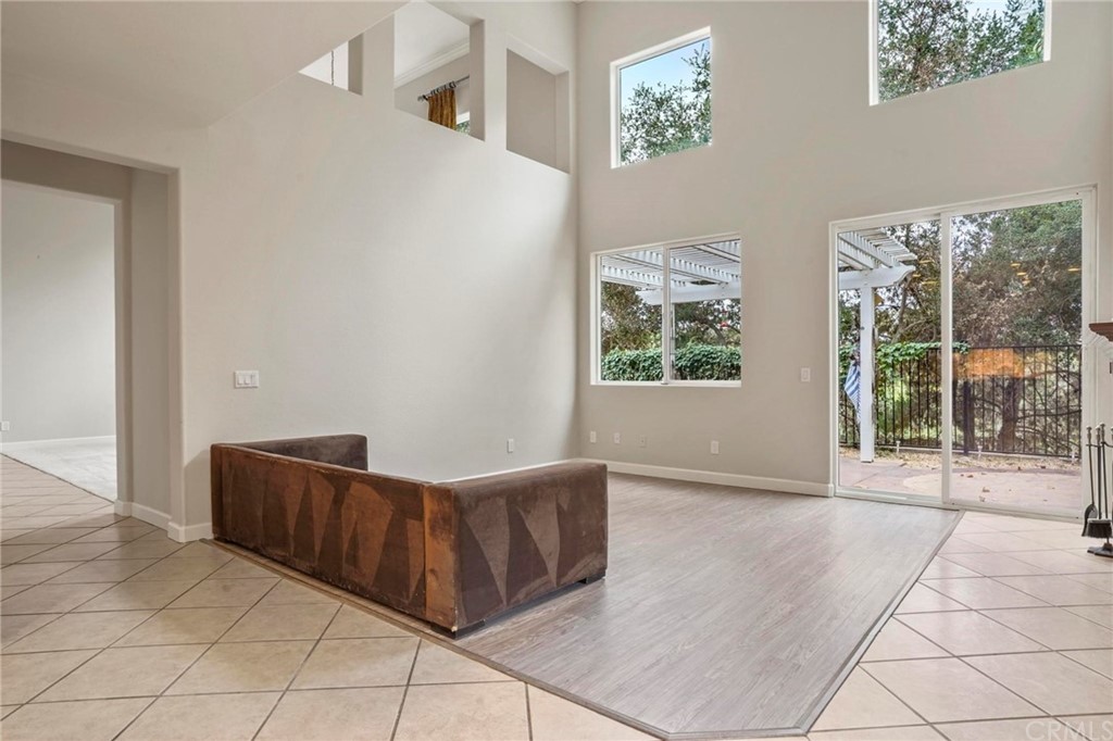 569 Inverlochy Drive Fallbrook, CA 92028 - Photo 10 of 36 an empty room with windows