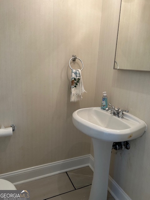 295 Handley Court Tyrone, GA 30290 - Photo 11 of 25 a bathroom with a sink and mirror