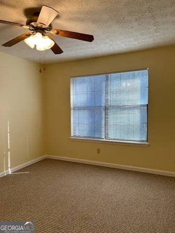 a view of a bathroom with a shower