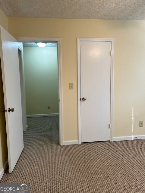 295 Handley Court Tyrone, GA 30290 - Photo 18 of 25 a view of a bathroom with a shower