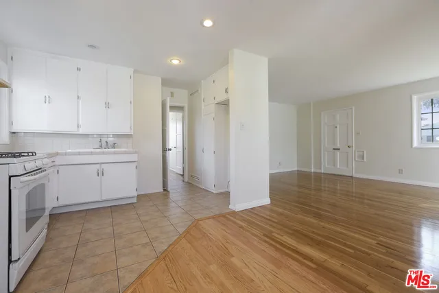 a view of kitchen with wooden floor
