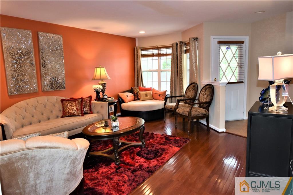 51 Hawthorne Road North Brunswick, NJ 08902 - Photo 2 of 23 a living room with furniture and wooden floor