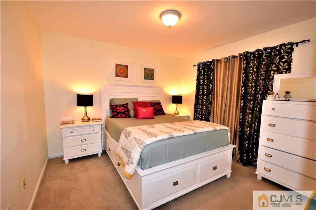 51 Hawthorne Road North Brunswick, NJ 08902 - Photo 14 of 23 a bedroom with a bed and a window