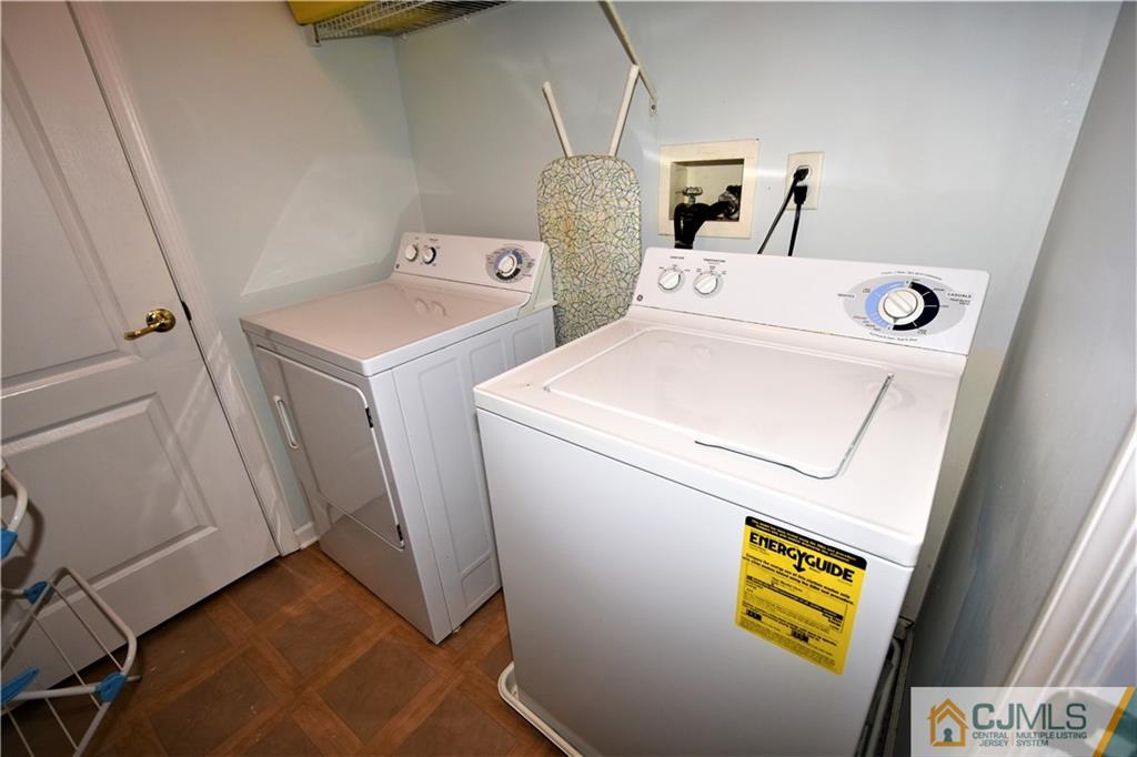 51 Hawthorne Road North Brunswick, NJ 08902 - Photo 17 of 23 a utility room with dryer and washer
