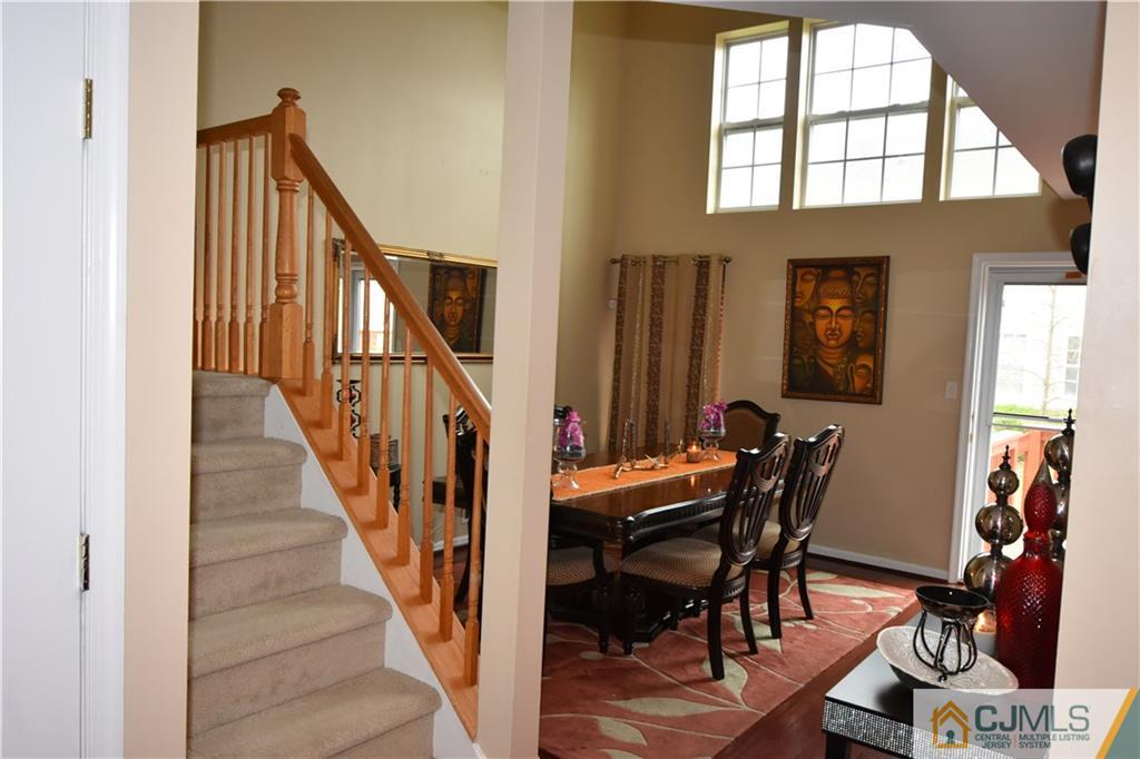 51 Hawthorne Road North Brunswick, NJ 08902 - Photo 5 of 23 a view of a livingroom with furniture and stairs