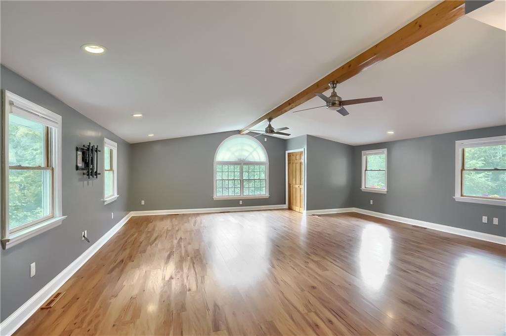 319 Dobson Road Mars, PA 16046 - Photo 13 of 25 a view of an empty room with wooden floor and a window