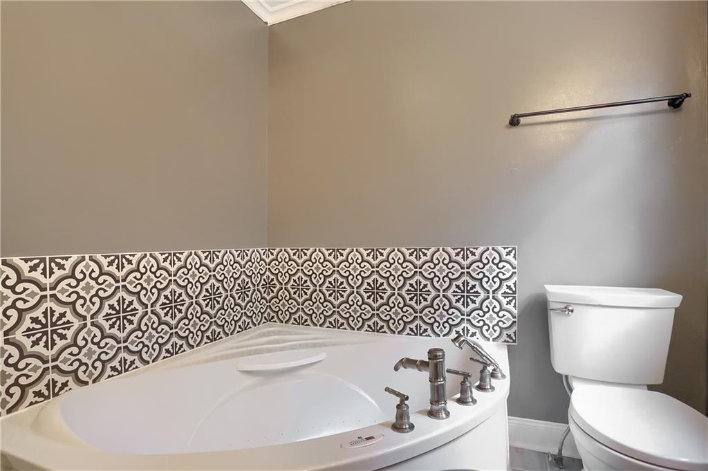 319 Dobson Road Mars, PA 16046 - Photo 18 of 25 a bathroom with a sink a toilet and a mirror