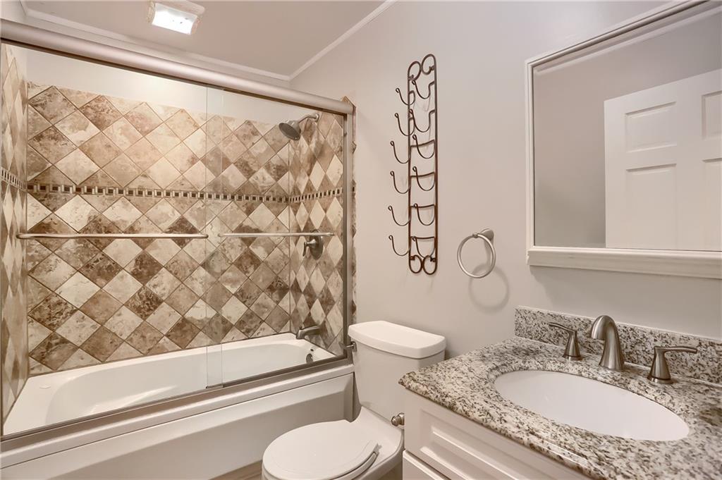 319 Dobson Road Mars, PA 16046 - Photo 20 of 25 a bathroom with a granite countertop sink toilet and shower