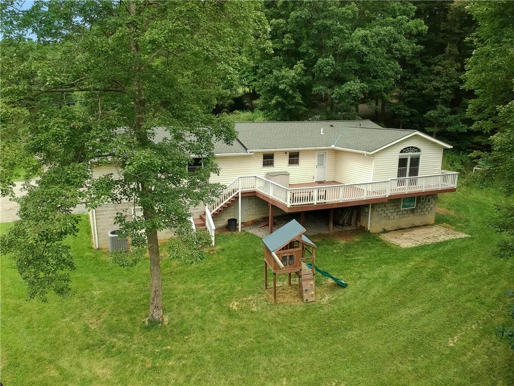 319 Dobson Road Mars, PA 16046 - Photo 22 of 25 a house that has tree in front of it