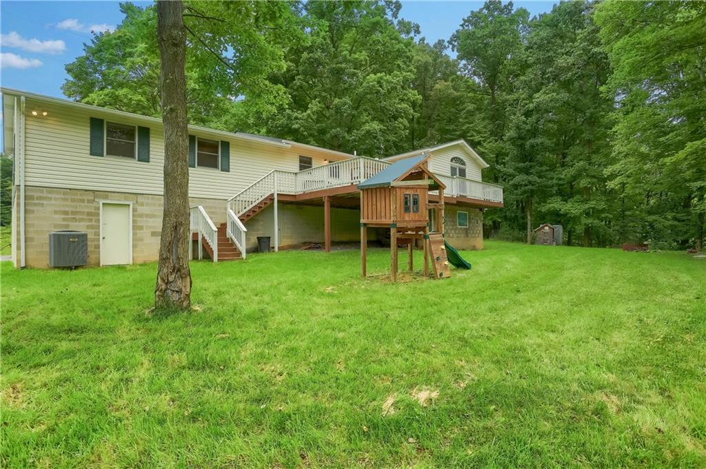 319 Dobson Road Mars, PA 16046 - Photo 23 of 25 a view of a house with a yard and sitting area