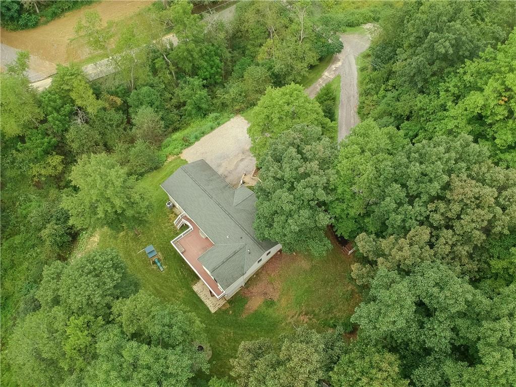 319 Dobson Road Mars, PA 16046 - Photo 25 of 25 an aerial view of a house with swimming pool and trees