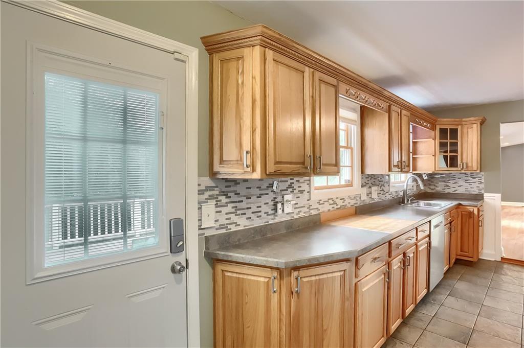 319 Dobson Road Mars, PA 16046 - Photo 9 of 25 a kitchen with a sink and a window