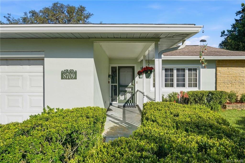 8709 East Sandpiper Drive Inverness, FL 34450 - Photo 21 of 37 a view of a house with a patio