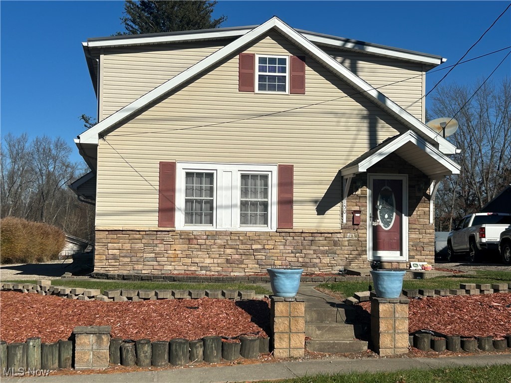 150 West Athens Road Roseville, OH 43777 - Photo 1 of 17 View of front of home featuring stone siding