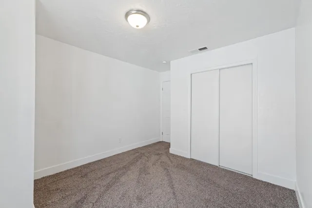 an empty room with a workbench