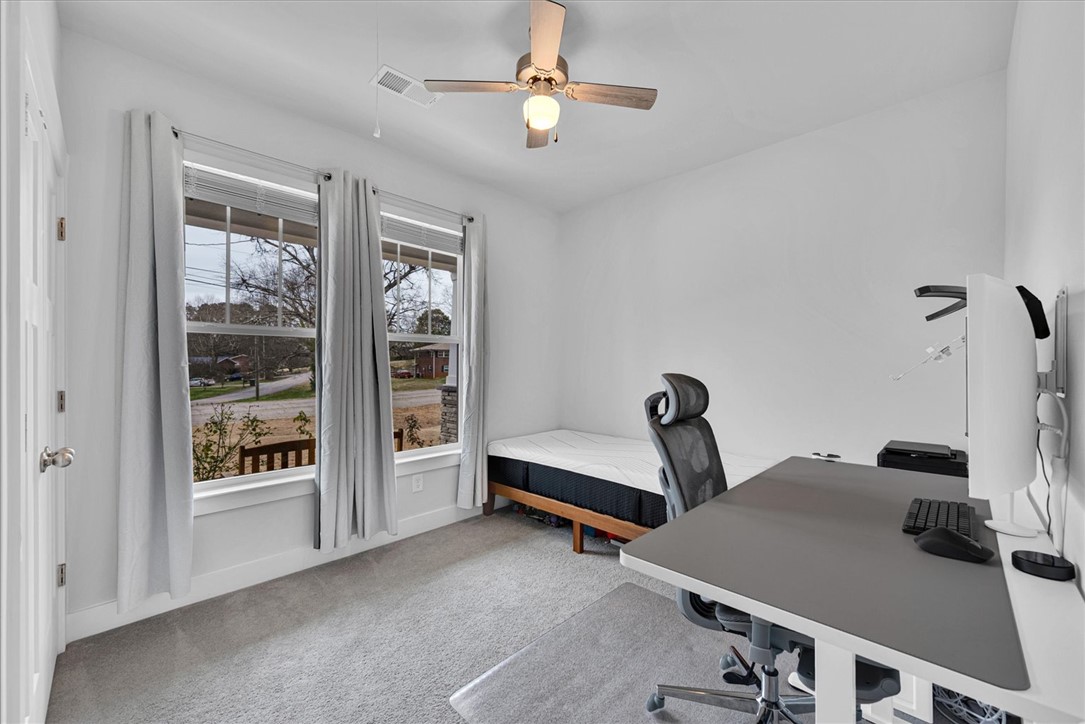 529 Overbrook Drive Seneca, SC 29678 - Photo 12 of 33 Bright and airy room with large windows, perfect for a productive office space or comfortable bedroom.