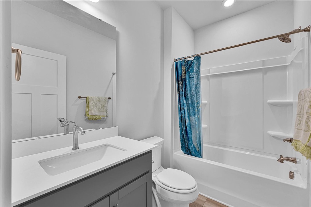 529 Overbrook Drive Seneca, SC 29678 - Photo 13 of 33 This clean bathroom features a sleek vanity and a tub-shower combination for daily routines.