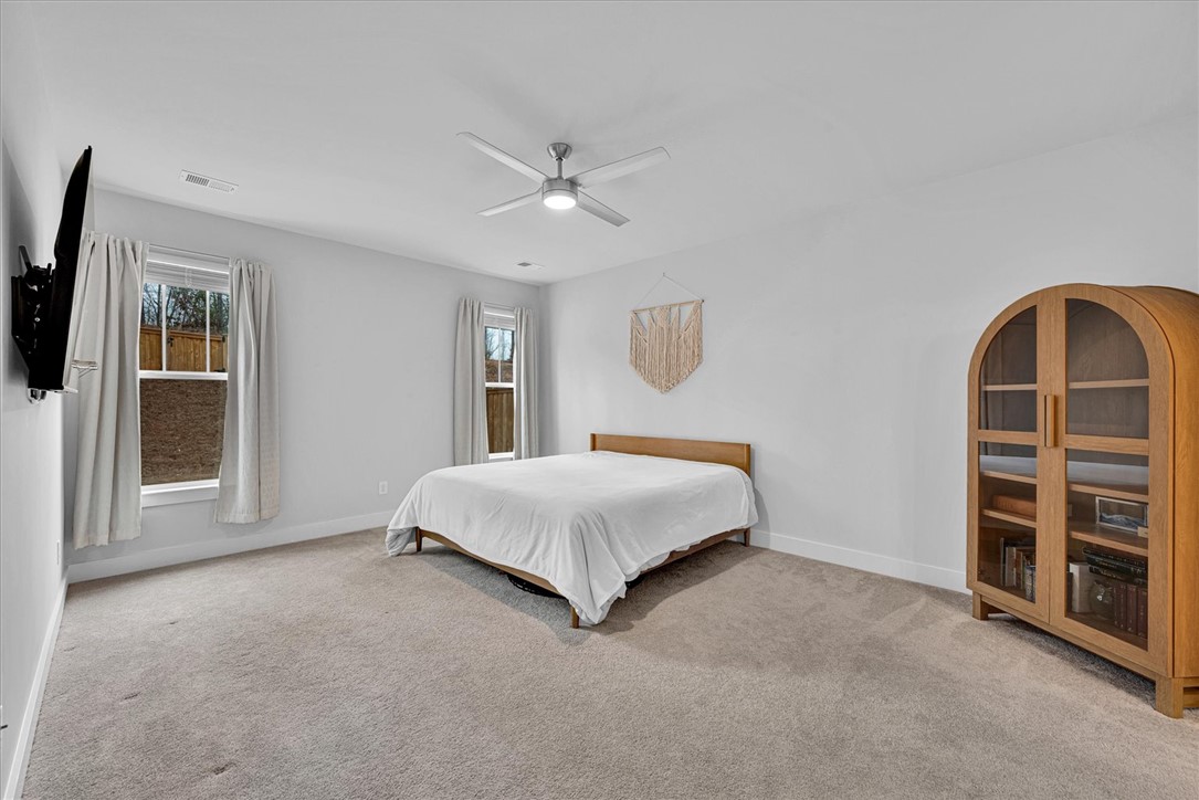 529 Overbrook Drive Seneca, SC 29678 - Photo 15 of 33 This peaceful bedroom offers comfort and a tranquil atmosphere with soft carpet flooring.