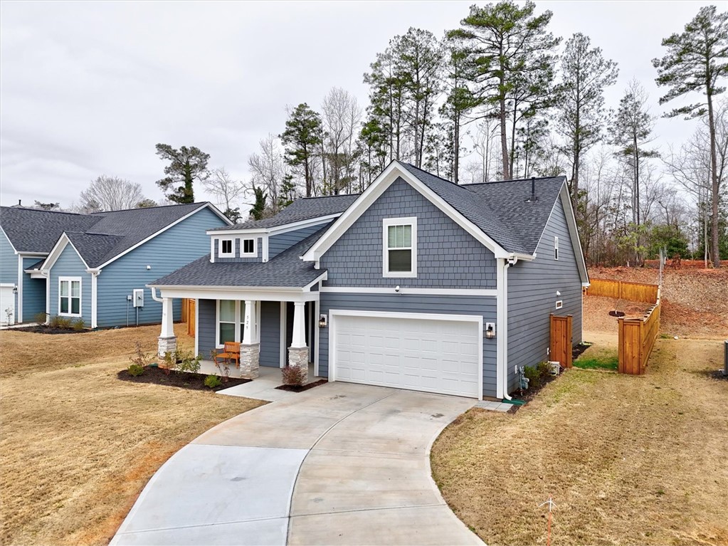 529 Overbrook Drive Seneca, SC 29678 - Photo 26 of 33 This inviting home features a covered porch, attached garage, and a long driveway.