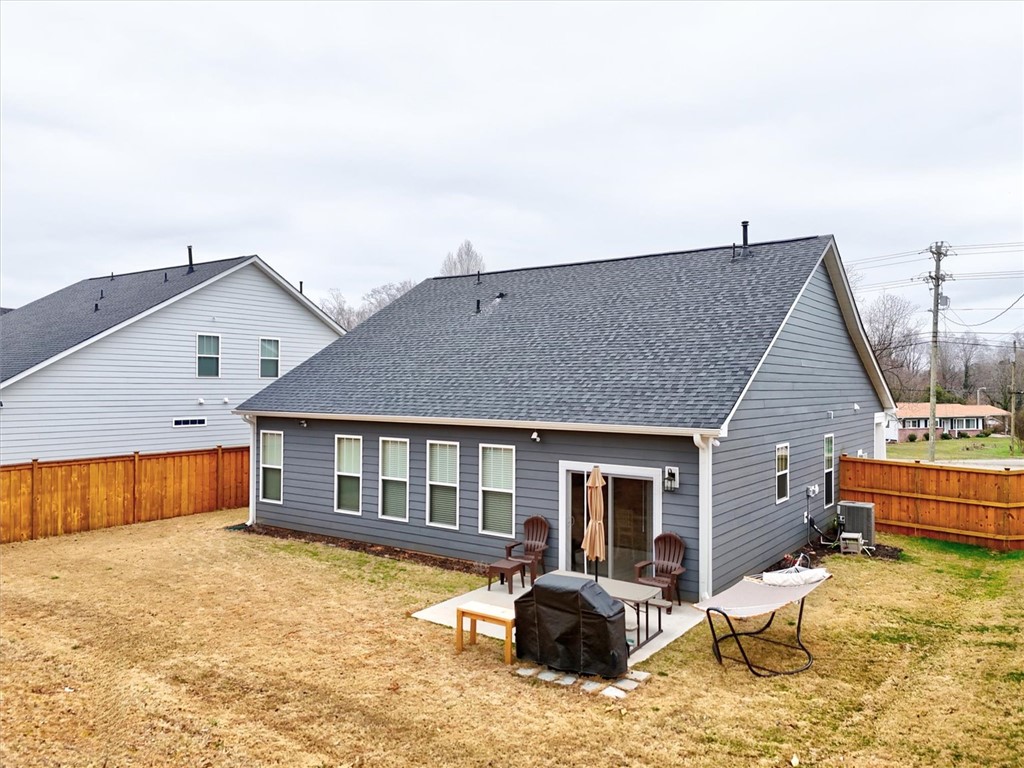 529 Overbrook Drive Seneca, SC 29678 - Photo 28 of 33 The home features a private backyard with a patio, offering a tranquil outdoor retreat.