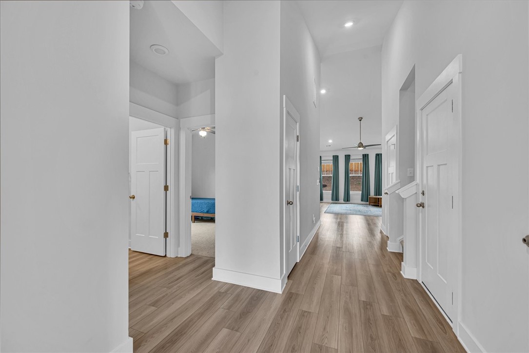 529 Overbrook Drive Seneca, SC 29678 - Photo 3 of 33 This spacious interior hallway features warm flooring and abundant natural light.