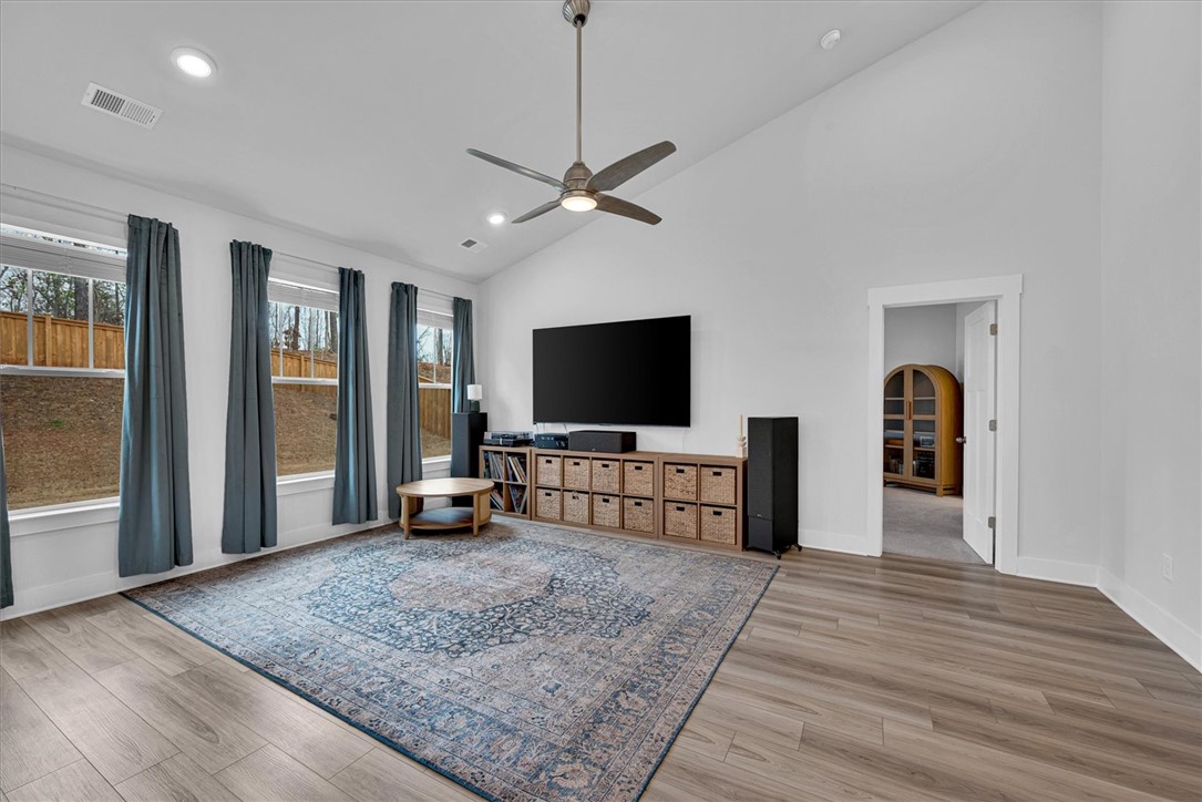 529 Overbrook Drive Seneca, SC 29678 - Photo 6 of 33 This bright living area features sleek wood flooring and a refreshing ceiling fan, perfect for relaxed gatherings.