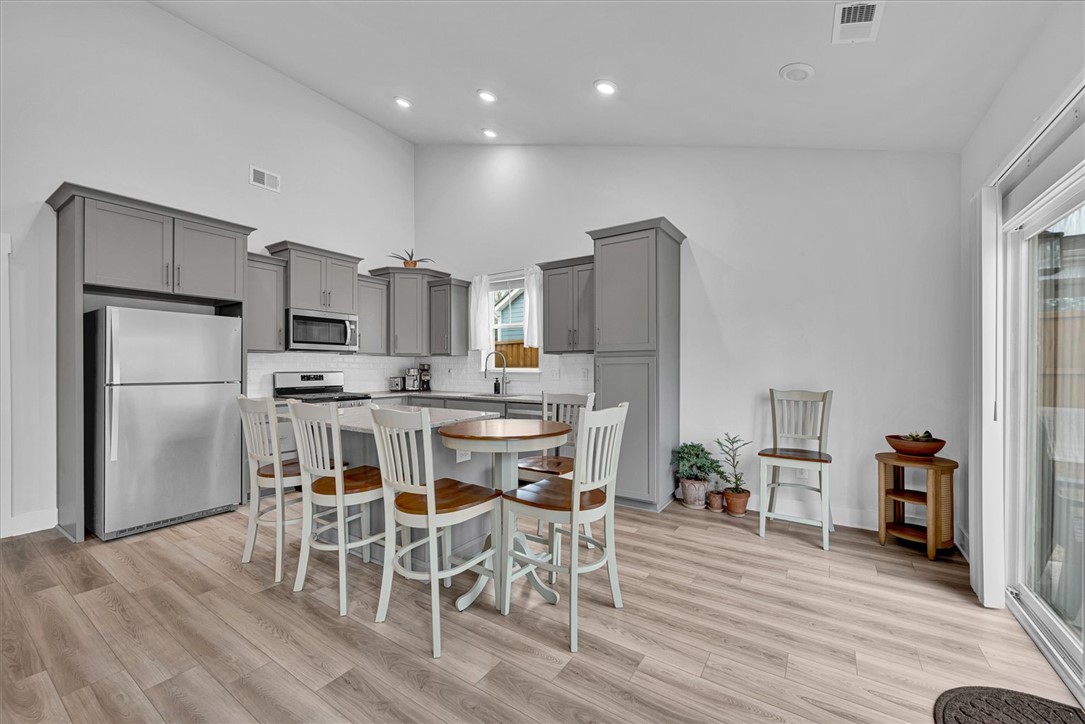 529 Overbrook Drive Seneca, SC 29678 - Photo 7 of 33 This spacious kitchen features ample cabinetry, a generous island, and an abundance of natural light.