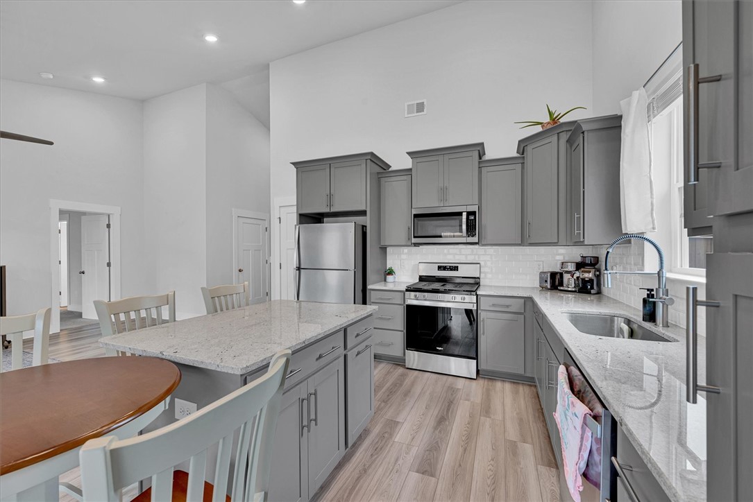 529 Overbrook Drive Seneca, SC 29678 - Photo 10 of 33 This modern kitchen features clean lines and a functional design, perfect for daily living and entertaining.